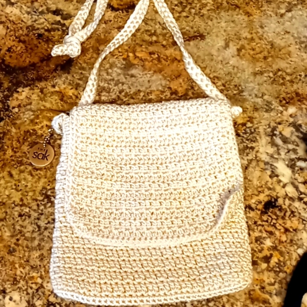 The Sak cream colored crossbody